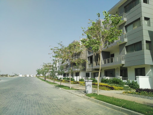 For sale in installments an apartment of 119 square meters with a garden in Tag Sultan Compound