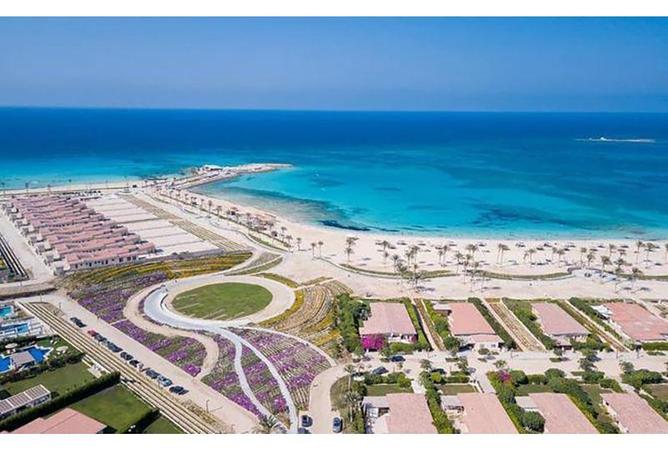 Own a villa inside Caesar Island Village North Coast with an area of 520 meters